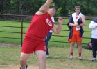 Aiden Moss competes in the shot put competition at district track meet last Wednesday, April 12. Photo by Mitchell Pate/Groesbeck Journal